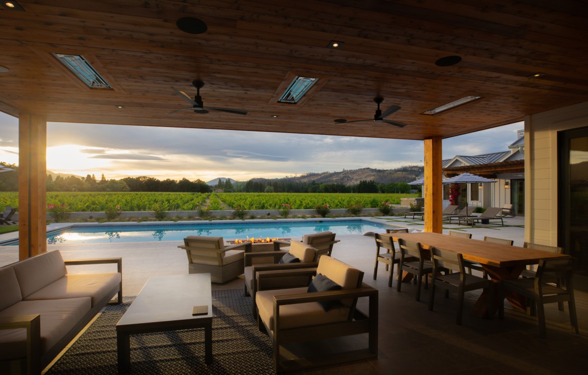 Palmer_05_Seating Outdoor living space with pool and vineyard view, Penning Landscapes design.
