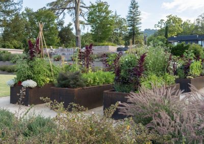 Raised vegetable garden beds and seasonal plantings for Napa Valley estate properties.