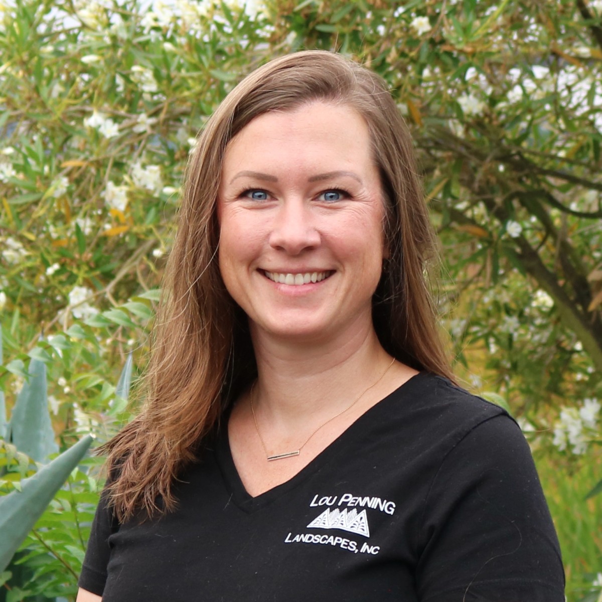 Katy Kabbe, Penning Landscapes Landscape Architect and Operations Manager, smiling portrait.
